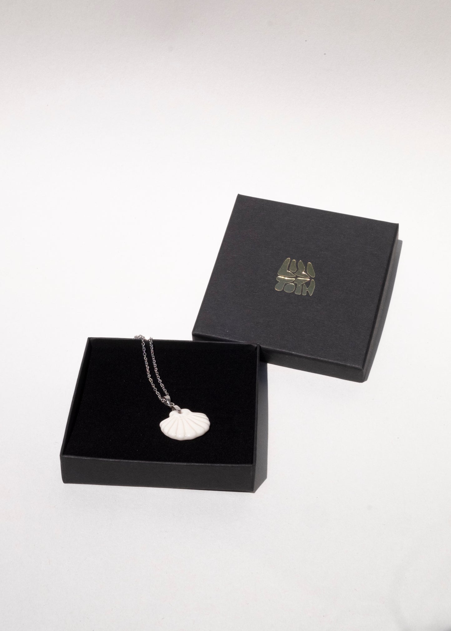Handmade porcelain shell pendant necklace