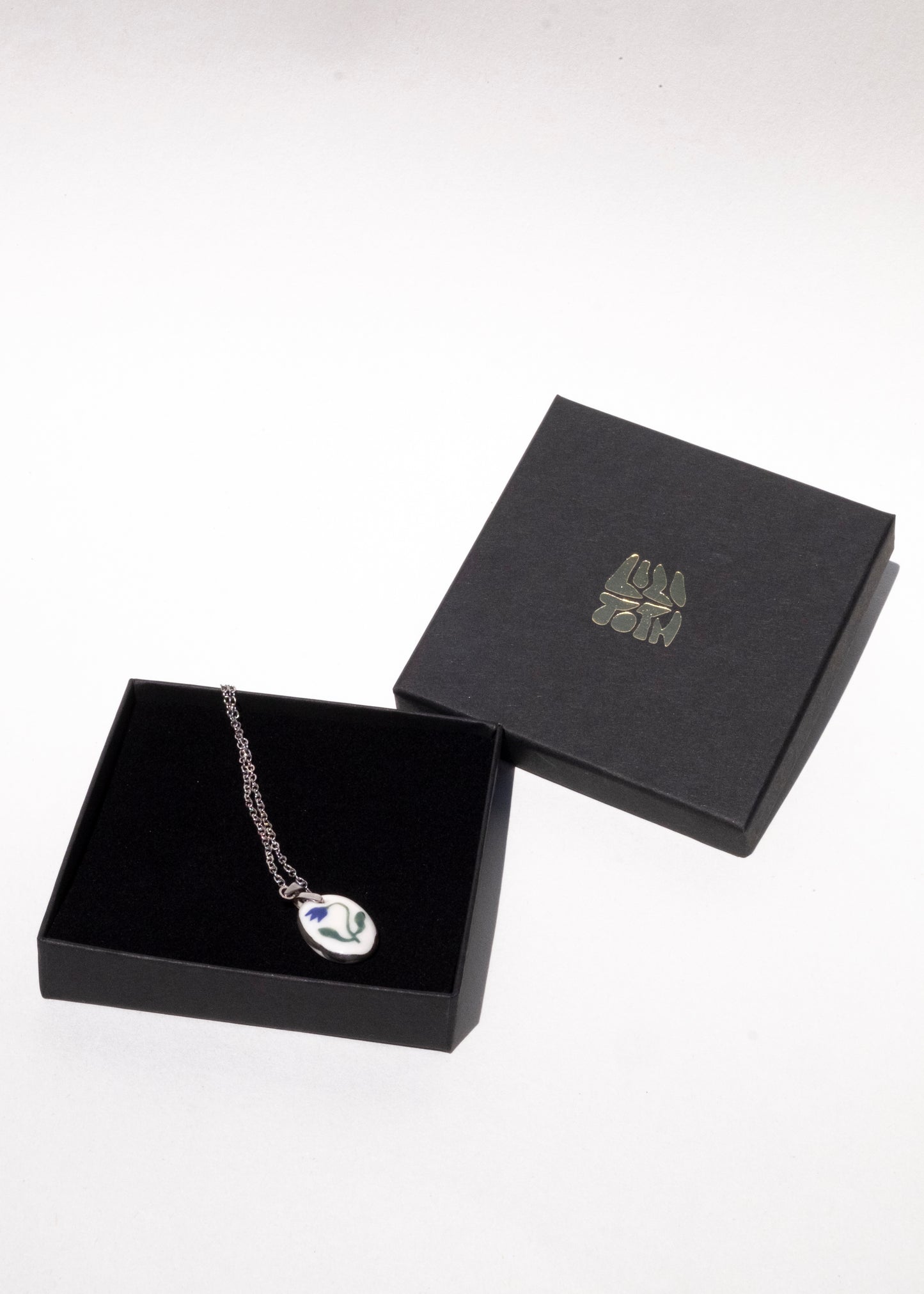 Handmade porcelain blue tulip pendant necklace